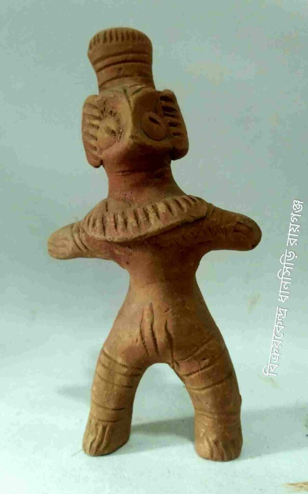 মাটির টেপা পুতুল